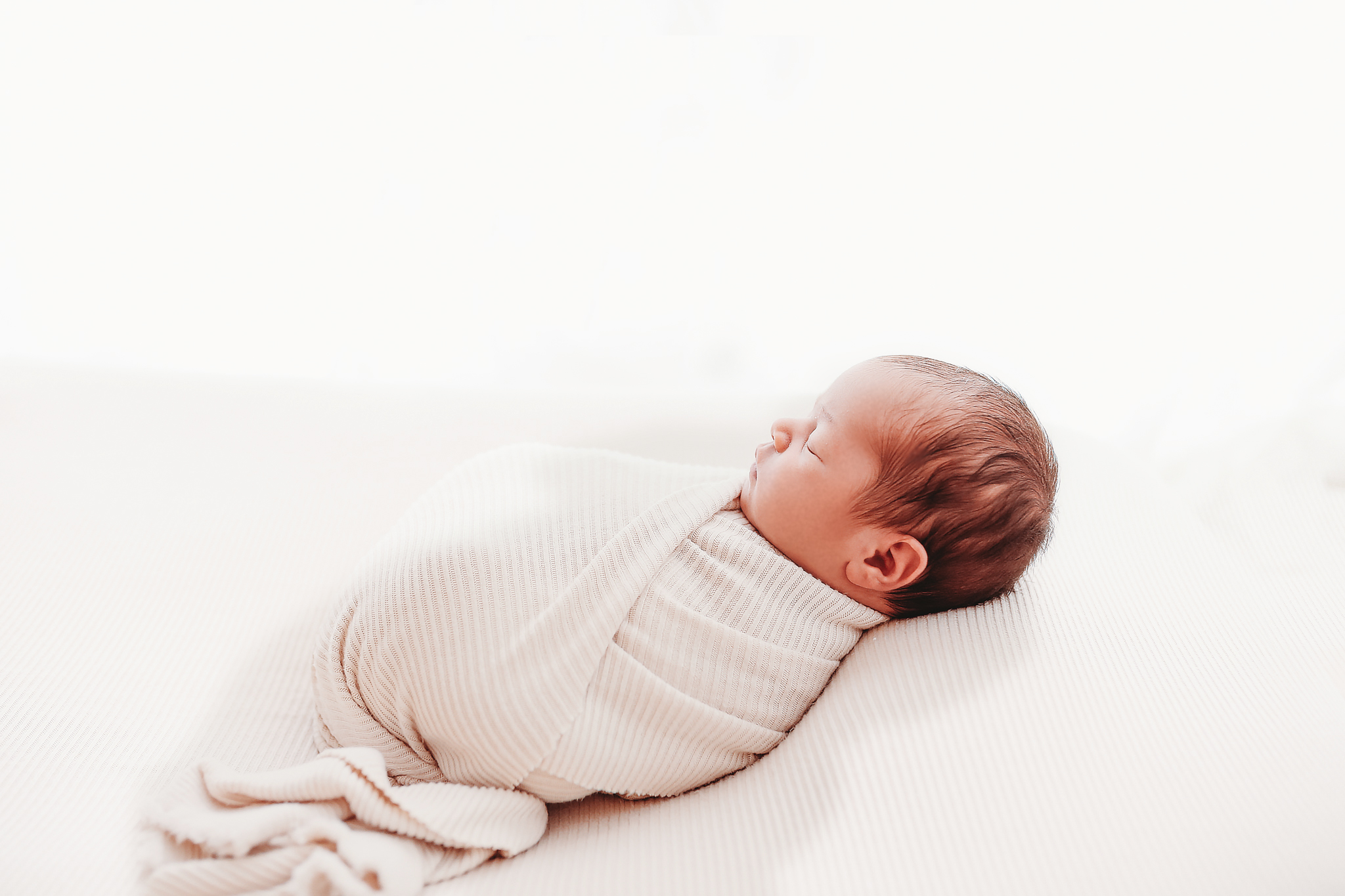 Newborn photographer Ellesmere Port — studio newborn session Cheshire