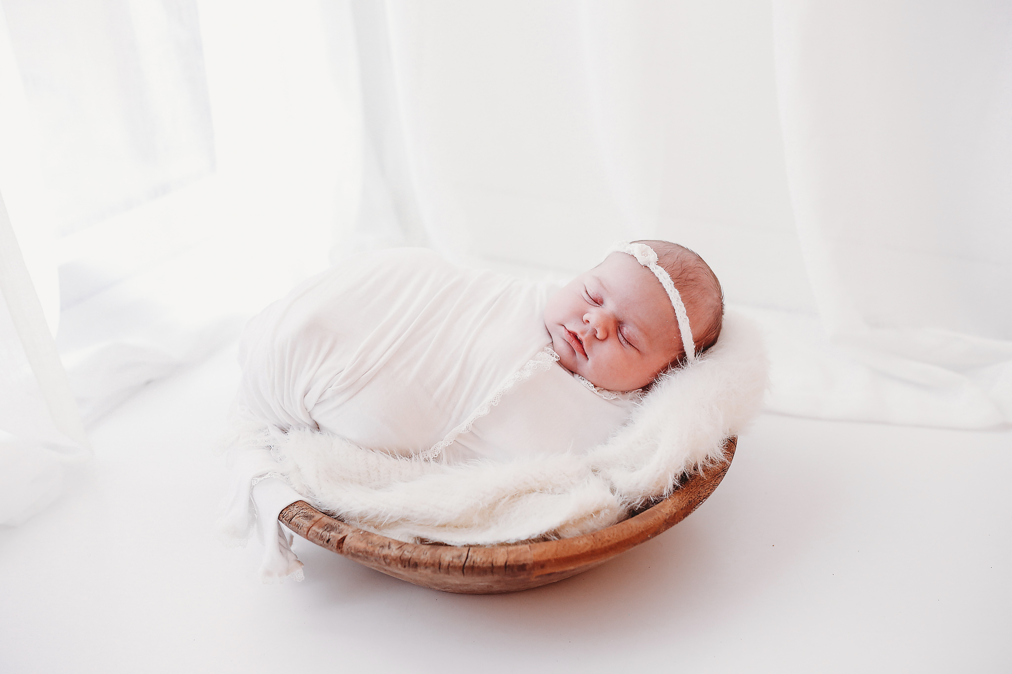 Newborn baby wrapped in studio Ellesmere Port